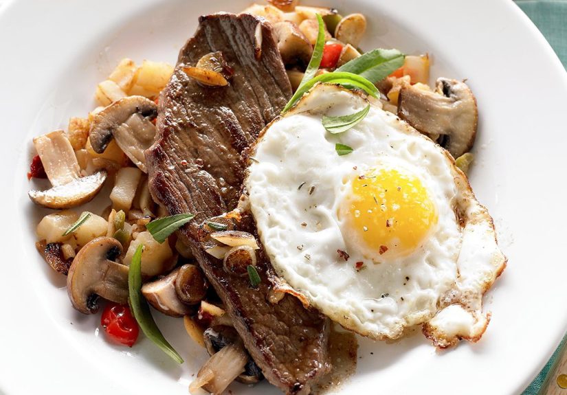 Frizzled Eggs over Garlic Steak and Mushroom Hash Recipe