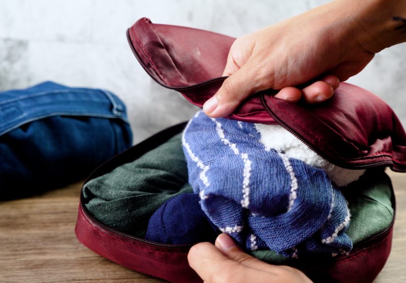 5 Ways to Roll Clothes for Packing Cubes