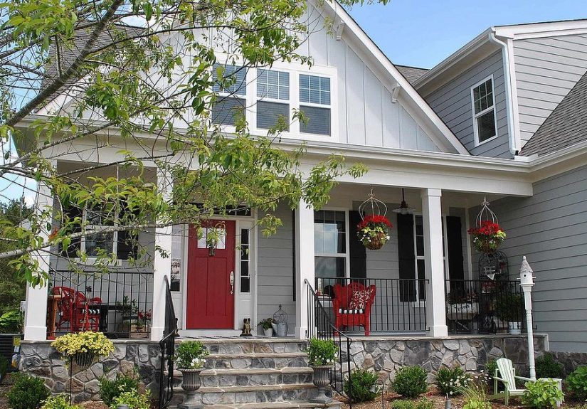 Farmhouse Style Front Porch With Pops of Red