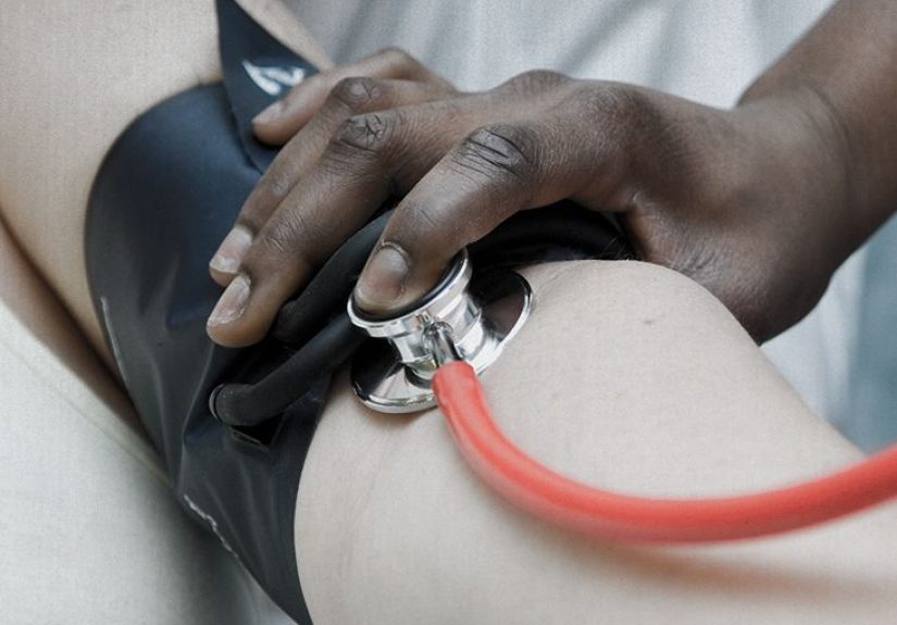 Why does hypertension occur in obesity?